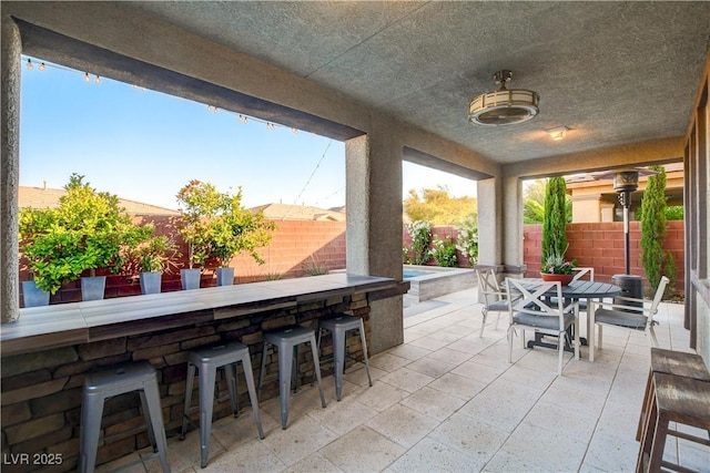 5434 Fawn Chase Way, Las Vegas, NV 89135 - fenced backyard featuring a patio area and outdoor dining space