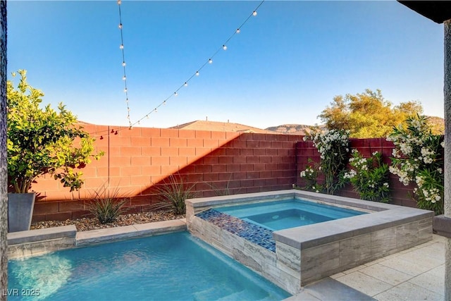 5434 Fawn Chase Way, Las Vegas, NV 89135 - view of swimming pool with an in-ground hot tub and a fenced backyard