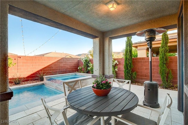 5434 Fawn Chase Way, Las Vegas, NV 89135 - fenced backyard with an in-ground hot tub and a patio