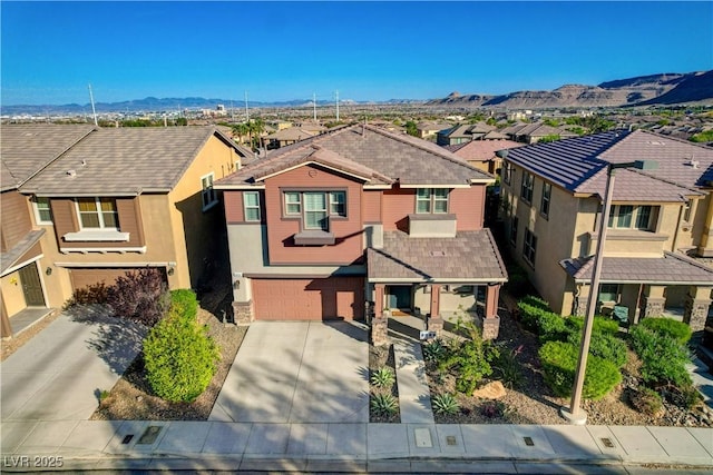 5434 Fawn Chase Way, Las Vegas, NV 89135 - traditional-style home featuring concrete driveway, a garage, a residential view, and a mountain view