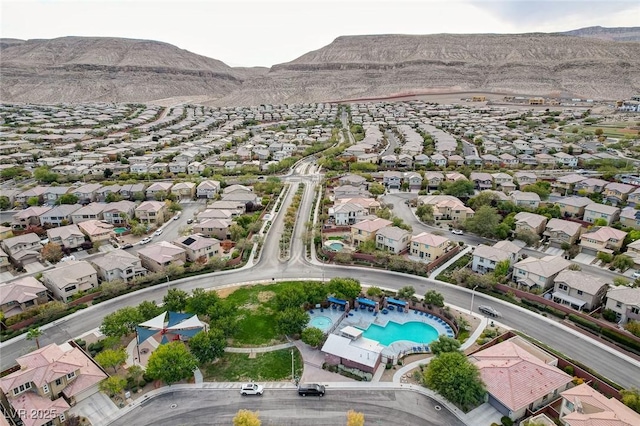 5434 Fawn Chase Way, Las Vegas, NV 89135 - aerial view of property and surrounding area with nearby suburban area, mountains, and a pool