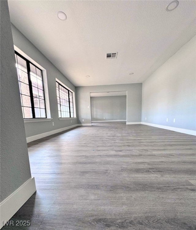 1967 N Moapa Valley Blvd, Logandale, NV 89021 - spare room featuring wood finished floors and a textured ceiling