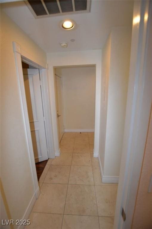 230 E Flamingo Rd Unit 129, Las Vegas, NV 89169 - hallway with baseboards and light tile patterned floors