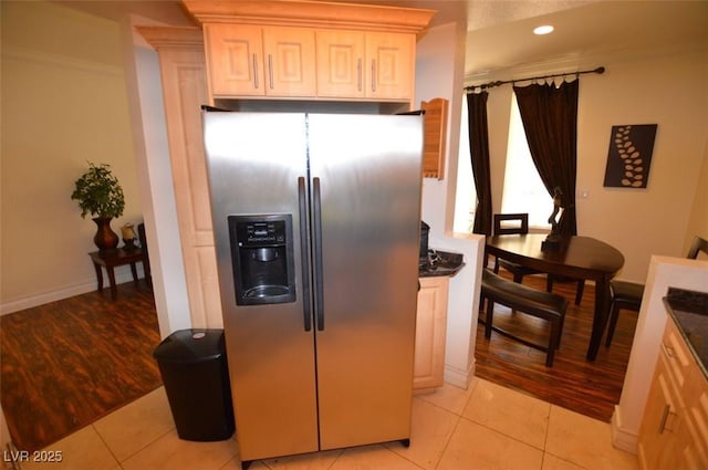 230 E Flamingo Rd Unit 129, Las Vegas, NV 89169 - kitchen featuring stainless steel fridge with ice dispenser, dark countertops, light tile patterned flooring, baseboards, and recessed lighting