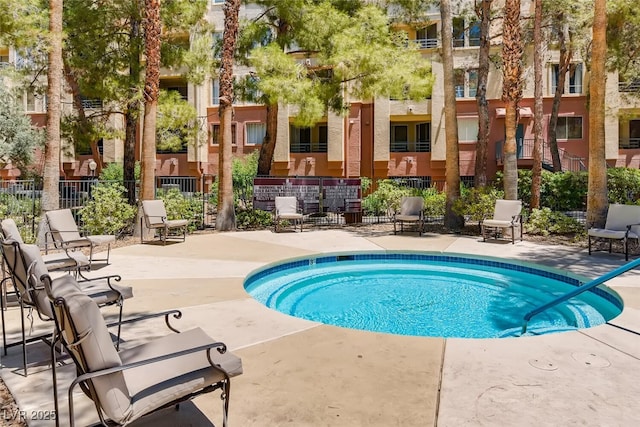 230 E Flamingo Rd Unit 129, Las Vegas, NV 89169 - view of pool with a swimming pool and a patio