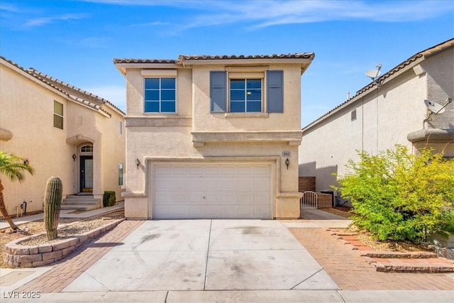 10642 Dawns Mist Ave, Las Vegas, NV 89129 - view of front of house with stucco siding, an attached garage, concrete driveway, a tiled roof, and a gate