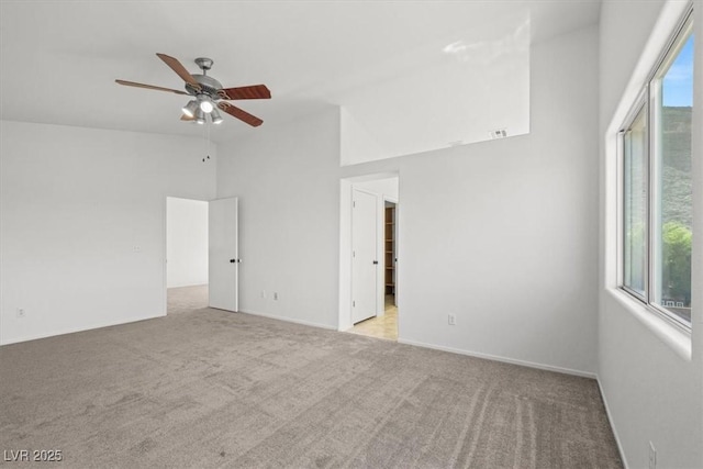 10642 Dawns Mist Ave, Las Vegas, NV 89129 - carpeted empty room featuring ceiling fan and high vaulted ceiling