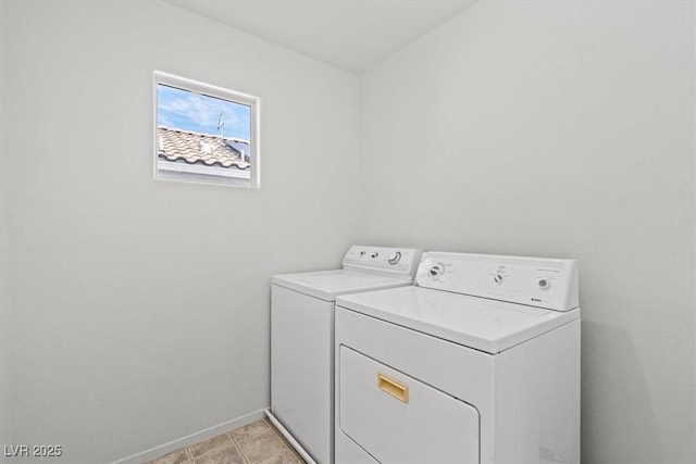 10642 Dawns Mist Ave, Las Vegas, NV 89129 - washroom featuring washing machine and clothes dryer and baseboards