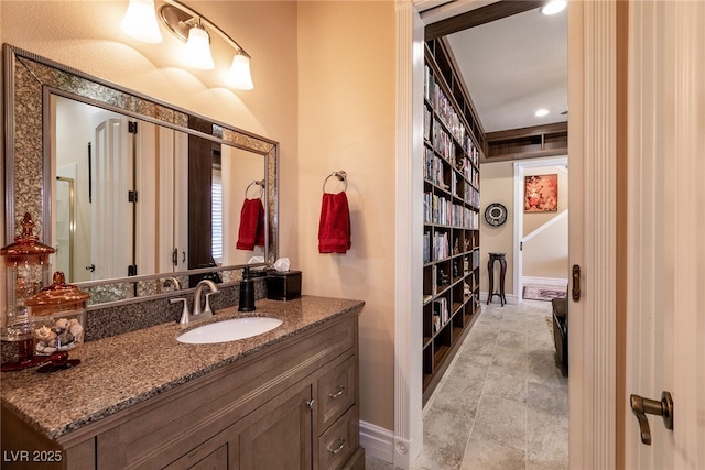 7718 Willow Cove Cir, Las Vegas, NV 89129 - bathroom with vanity and baseboards