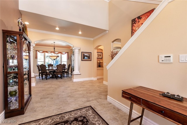 7718 Willow Cove Cir, Las Vegas, NV 89129 - entryway featuring arched walkways, decorative columns, ornamental molding, baseboards, and recessed lighting