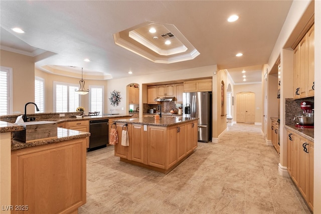 7718 Willow Cove Cir, Las Vegas, NV 89129 - kitchen with arched walkways, dishwasher, a tray ceiling, stainless steel fridge with ice dispenser, and crown molding