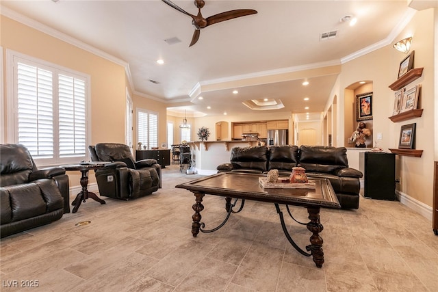 7718 Willow Cove Cir, Las Vegas, NV 89129 - living room with baseboards, ceiling fan, ornamental molding, arched walkways, and recessed lighting