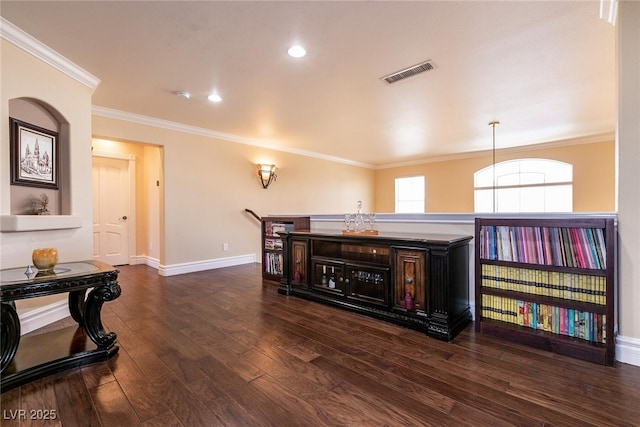 7718 Willow Cove Cir, Las Vegas, NV 89129 - living room with wood finished floors, crown molding, baseboards, and recessed lighting