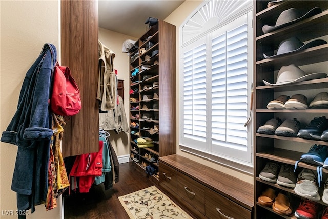 7718 Willow Cove Cir, Las Vegas, NV 89129 - walk in closet with dark wood-type flooring