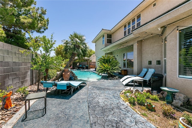 7718 Willow Cove Cir, Las Vegas, NV 89129 - fenced backyard with a patio area