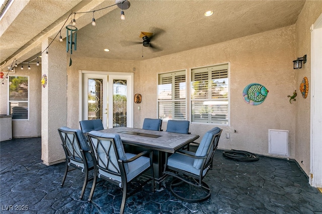 7718 Willow Cove Cir, Las Vegas, NV 89129 - view of patio with outdoor dining area, ceiling fan, and french doors