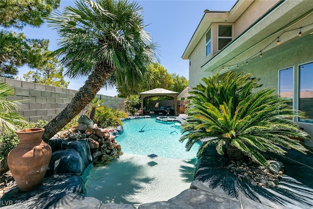 7718 Willow Cove Cir, Las Vegas, NV 89129 - view of swimming pool with a gazebo, a fenced backyard, and a patio