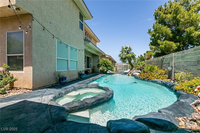 7718 Willow Cove Cir, Las Vegas, NV 89129 - view of pool with a fenced backyard and a pool with connected hot tub