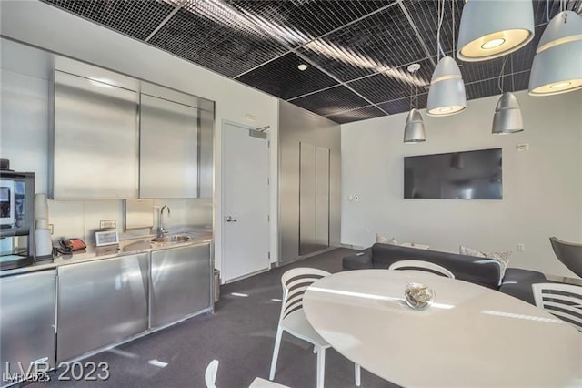3722 Las Vegas Blvd Unit 603, Las Vegas, NV 89158 - kitchen featuring a sink and decorative light fixtures
