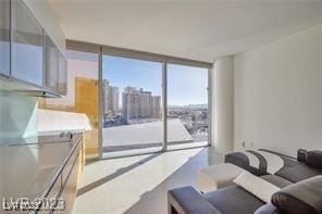 3722 Las Vegas Blvd Unit 603, Las Vegas, NV 89158 - living room featuring floor to ceiling windows