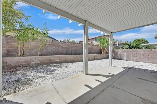 3935 Tirana Way, Las Vegas, NV 89103 - fenced backyard with a patio