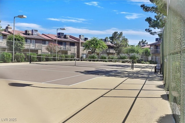 3935 Tirana Way, Las Vegas, NV 89103 - view of tennis court with a residential view