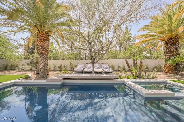 2231 S Tioga Way, Las Vegas, NV 89117 - view of swimming pool featuring a fenced backyard and a pool with connected hot tub