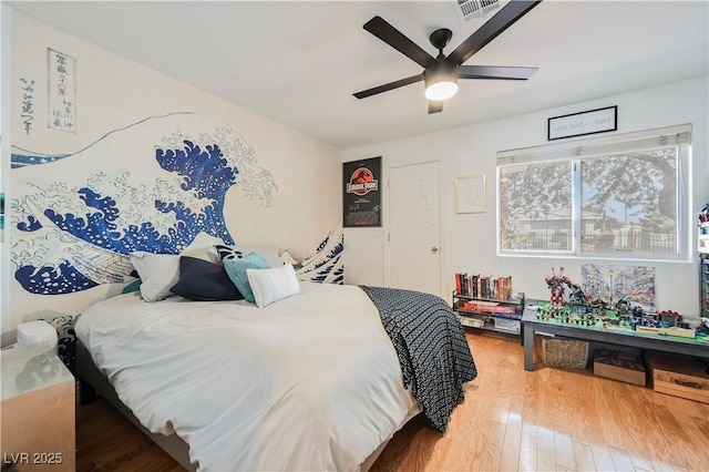 2231 S Tioga Way, Las Vegas, NV 89117 - bedroom with wood finished floors and a ceiling fan