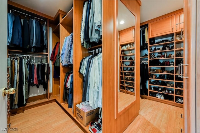 2231 S Tioga Way, Las Vegas, NV 89117 - spacious closet featuring wood finished floors