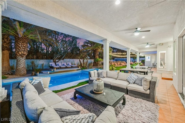 2231 S Tioga Way, Las Vegas, NV 89117 - fenced backyard featuring an outdoor hangout area, ceiling fan, and a patio area