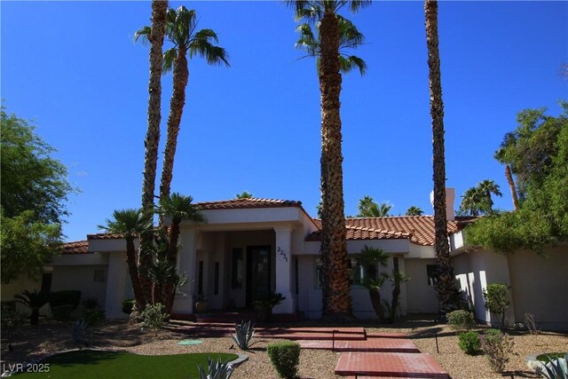 2231 S Tioga Way, Las Vegas, NV 89117 - mediterranean / spanish-style home featuring a tile roof and stucco siding