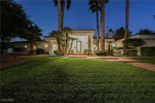 2231 S Tioga Way, Las Vegas, NV 89117 - mediterranean / spanish home with a front lawn and stucco siding