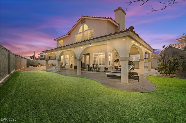 2021 Summit Pointe Dr, Las Vegas, NV 89117 - rear view of house with stucco siding, a chimney, a patio, and a tiled roof