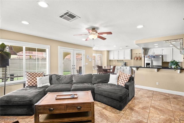 2021 Summit Pointe Dr, Las Vegas, NV 89117 - living room featuring a ceiling fan, french doors, baseboards, recessed lighting, and light tile patterned floors