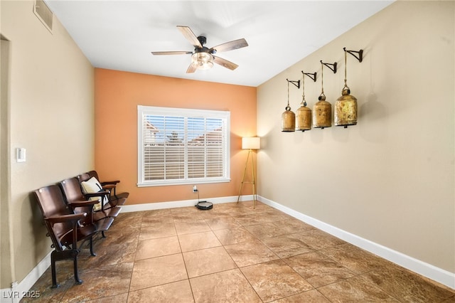 2021 Summit Pointe Dr, Las Vegas, NV 89117 - living area featuring ceiling fan and baseboards