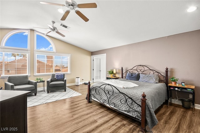 2021 Summit Pointe Dr, Las Vegas, NV 89117 - bedroom featuring wood finished floors, lofted ceiling, baseboards, a ceiling fan, and recessed lighting