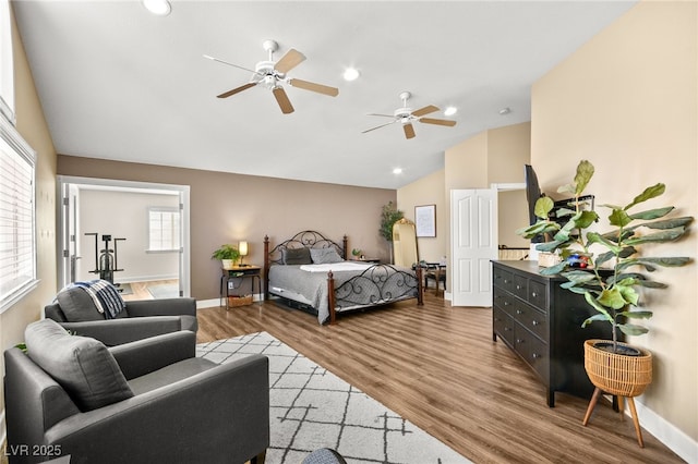2021 Summit Pointe Dr, Las Vegas, NV 89117 - bedroom with light wood-style floors, baseboards, recessed lighting, high vaulted ceiling, and ceiling fan