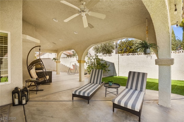 2021 Summit Pointe Dr, Las Vegas, NV 89117 - fenced backyard with a patio and a ceiling fan