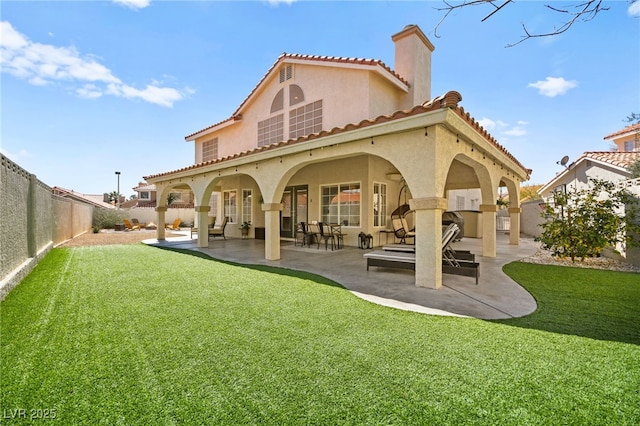 2021 Summit Pointe Dr, Las Vegas, NV 89117 - back of house with stucco siding, a patio, a chimney, a tile roof, and outdoor lounge area