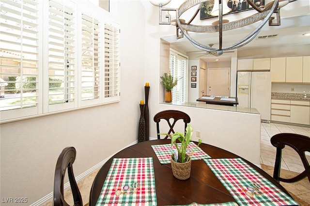 4911 Mount Pleasant Ln, Las Vegas, NV 89113 - dining area with baseboards
