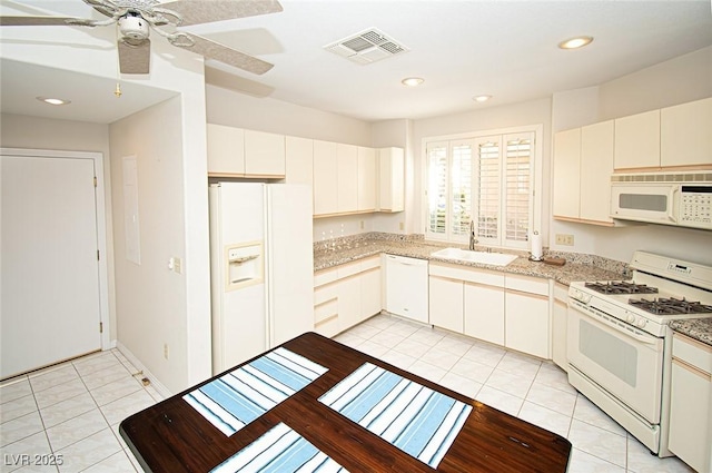 4911 Mount Pleasant Ln, Las Vegas, NV 89113 - kitchen featuring white appliances, a sink, light tile patterned flooring, recessed lighting, and a ceiling fan