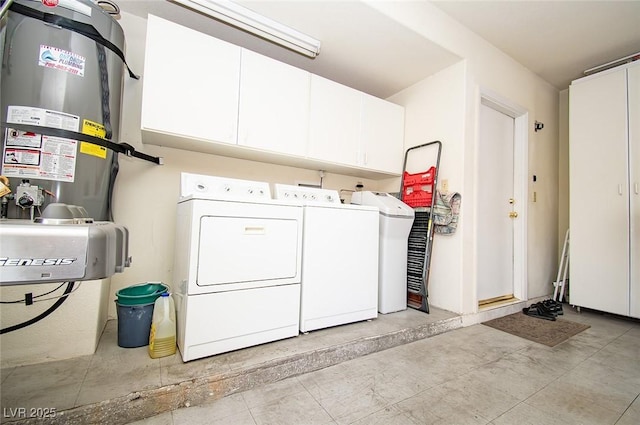 4911 Mount Pleasant Ln, Las Vegas, NV 89113 - washroom featuring cabinet space, washer and clothes dryer, and water heater