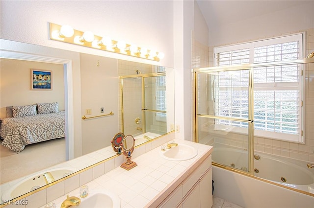 4911 Mount Pleasant Ln, Las Vegas, NV 89113 - full bath with plenty of natural light, double vanity, ensuite bath, and a combined bath / shower with jetted tub