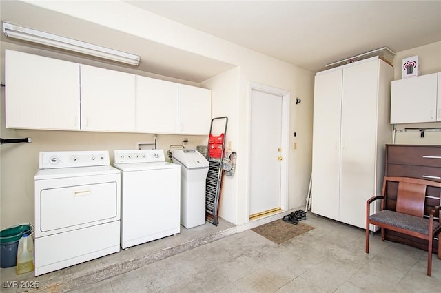 4911 Mount Pleasant Ln, Las Vegas, NV 89113 - laundry area featuring cabinet space and separate washer and dryer