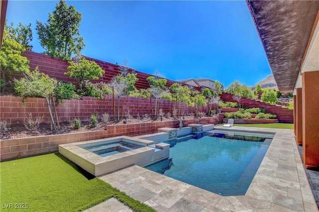 10433 Ember Rose Ave, Las Vegas, NV 89135 - view of pool featuring a fenced backyard and a pool with connected hot tub