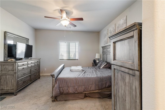 42 Late Harvest Ave, Pahrump, NV 89060 - bedroom featuring light colored carpet, ceiling fan, and baseboards