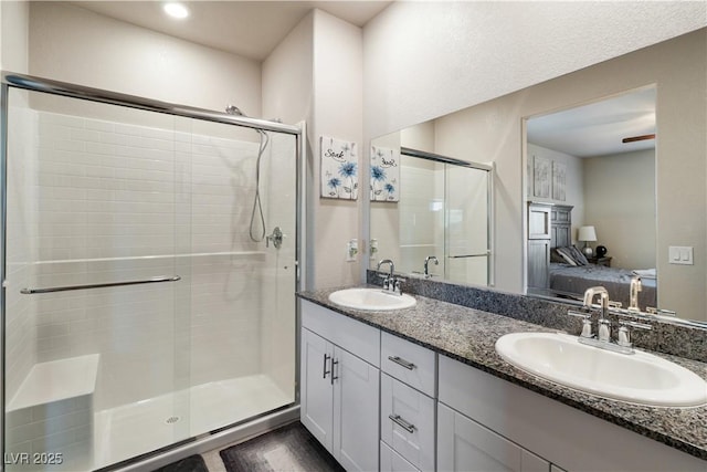 42 Late Harvest Ave, Pahrump, NV 89060 - ensuite bathroom with a stall shower and double vanity