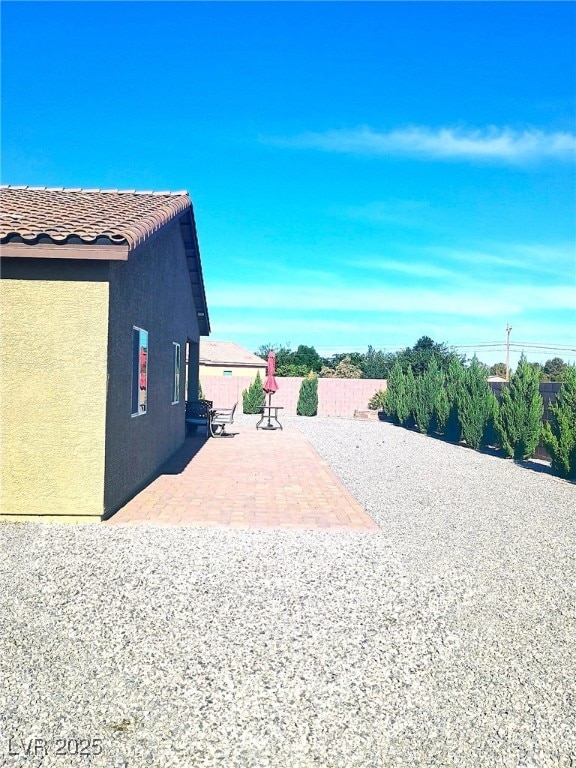 42 Late Harvest Ave, Pahrump, NV 89060 - fenced yard with a patio area