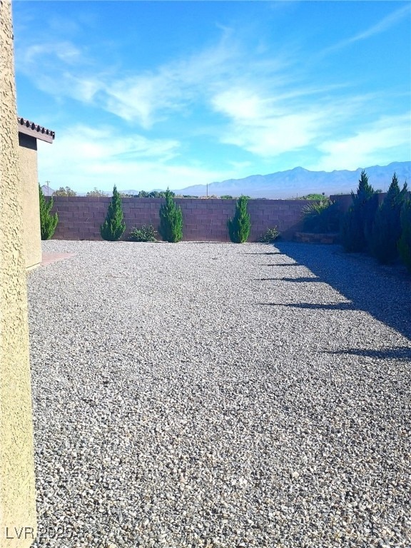 42 Late Harvest Ave, Pahrump, NV 89060 - fenced backyard featuring a mountain view