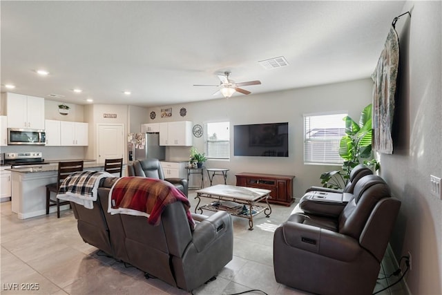 42 Late Harvest Ave, Pahrump, NV 89060 - living room featuring ceiling fan, recessed lighting, and light tile patterned floors